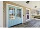 Charming home featuring a light blue glass front door and a welcoming front porch at 288 Joseph Alexander Dr, Fuquay Varina, NC 27526