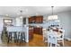 Spacious kitchen with stainless appliances, breakfast bar, and an adjacent breakfast nook at 288 Joseph Alexander Dr, Fuquay Varina, NC 27526