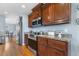 Well-equipped kitchen features stainless steel appliances and wooden cabinets at 288 Joseph Alexander Dr, Fuquay Varina, NC 27526
