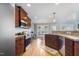 Bright kitchen area with stainless steel appliances, wood cabinets, and hardwood floors at 288 Joseph Alexander Dr, Fuquay Varina, NC 27526