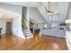 Spacious living room with hardwood floors, vaulted ceilings, and an open floor plan at 288 Joseph Alexander Dr, Fuquay Varina, NC 27526