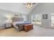 Serene bedroom with a vaulted ceiling, large window and neutral decor at 288 Joseph Alexander Dr, Fuquay Varina, NC 27526