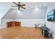 Spacious bonus room featuring a ceiling fan and hardwood floors at 301 Kinsale Dr, Chapel Hill, NC 27517