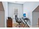 Office area with hardwood floors, a desk, and comfortable chair with a window to the outside at 301 Kinsale Dr, Chapel Hill, NC 27517