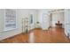 Office with hardwood flooring, natural light, and decorative shelving at 301 Kinsale Dr, Chapel Hill, NC 27517