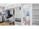 Spacious walk-in closet with built-in shelving and wooden floor at 301 Kinsale Dr, Chapel Hill, NC 27517