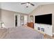 Spacious main bedroom featuring a vaulted ceiling and large entertainment center at 34 Triton Ct, Clayton, NC 27520