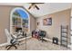 Home office with vaulted ceiling, natural light, and a neutral color scheme at 34 Triton Ct, Clayton, NC 27520