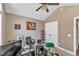 Comfortable home office space with a ceiling fan and neutral color palette at 34 Triton Ct, Clayton, NC 27520