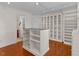 Walk-in closet with built-in shelves, cabinets, and storage at 405 Silver Creek Trl, Chapel Hill, NC 27514