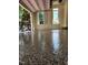 Garage featuring epoxy flooring, windows for natural light, and storage cabinets at 405 Silver Creek Trl, Chapel Hill, NC 27514