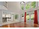 Open living room with hardwood floors, fireplace, and open flow to kitchen at 405 Silver Creek Trl, Chapel Hill, NC 27514