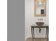 Stylish powder room featuring a decorative vessel sink and elegant mirror at 405 Silver Creek Trl, Chapel Hill, NC 27514