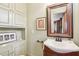 Charming powder room with unique fixtures and a cozy atmosphere, perfect for guests at 411 Circle Dr, Burlington, NC 27215