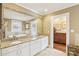 The bathroom features a double vanity and ample storage to suit any home owner's needs at 411 Circle Dr, Burlington, NC 27215
