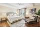 The main bedroom offers great natural light and neutral tones, perfect for a relaxing environment at 411 Circle Dr, Burlington, NC 27215