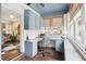 The beautiful home office features custom cabinets, a unique ceiling and an abundance of natural light at 411 Circle Dr, Burlington, NC 27215