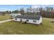 Aerial view of home with large manicured lawn at 4194 Abattoir Rd, Angier, NC 27501