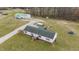 Aerial perspective of home, outbuilding, and large gravel drive at 4194 Abattoir Rd, Angier, NC 27501