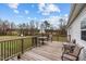 Spacious back deck with views of the yard and surrounding nature, ideal for outdoor enjoyment at 4194 Abattoir Rd, Angier, NC 27501