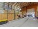 Large barn with stalls and a truck parked inside at 4194 Abattoir Rd, Angier, NC 27501