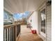 A relaxing deck area showcasing outdoor seating and room for entertainment near the door at 4194 Abattoir Rd, Angier, NC 27501