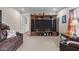 Spacious living room with a large entertainment center and comfortable seating at 4194 Abattoir Rd, Angier, NC 27501
