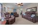 Inviting living room features plush, reclining seating and neutral decor at 4194 Abattoir Rd, Angier, NC 27501