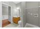 Bathroom featuring vanity with wood finish, white toilet, and tile flooring at 556 Village Loop Dr, Apex, NC 27502