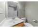 Bathroom featuring a white sink and a vanity with a wood finish, and white toilet at 556 Village Loop Dr, Apex, NC 27502