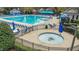 Upscale community pool and spa area offering a luxurious lifestyle with amenities for relaxation and recreation at 556 Village Loop Dr, Apex, NC 27502
