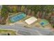Aerial view of tennis, volleyball and basketball courts in the community at 556 Village Loop Dr, Apex, NC 27502