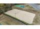 Sandy volleyball court next to a tennis court with basketball court beyond at 556 Village Loop Dr, Apex, NC 27502