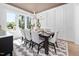 Bright dining room featuring stylish decor, a large window, and ample seating for dinner parties at 604 Edmund St, Raleigh, NC 27604