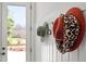 Entryway showing decorative hats hung on wall by the front door at 604 Edmund St, Raleigh, NC 27604