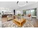 Open concept living space featuring a modern kitchen and a stylishly furnished living room at 604 Edmund St, Raleigh, NC 27604
