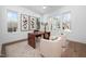 Bright and airy home office with multiple windows, hardwood floors, and modern furniture at 604 Edmund St, Raleigh, NC 27604