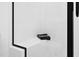 Modern shower with black frame and tiled seat featuring a dark towel at 604 Edmund St, Raleigh, NC 27604