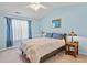 Bright bedroom featuring a ceiling fan, lots of light, and carpeted floors at 605 Wyndham Dr, Fuquay Varina, NC 27526