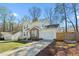 Lovely two-story home with a garage, brick facade and a well-kept lawn at 605 Wyndham Dr, Fuquay Varina, NC 27526