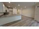 Kitchen featuring granite countertops, stainless faucet, recessed lighting, and neutral wall color at 6405 Granite Quarry Dr, Raleigh, NC 27610