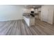 Kitchen with a large center island, granite counters, and stainless appliances at 6405 Granite Quarry Dr, Raleigh, NC 27610