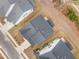 Birds eye view of several homes with manicured lawns and paved driveways at 724 Red Arrow Dr, Knightdale, NC 27545