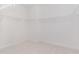 Clean, bright walk-in closet, ready for organization with white wire shelving at 724 Red Arrow Dr, Knightdale, NC 27545