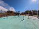 Colorful splash pad in a community park with a green turf surface and fun spray features at 724 Red Arrow Dr, Knightdale, NC 27545