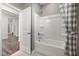 This bathroom features vinyl wood floors and new tiling at 752 Ben Ledi Ct, Raleigh, NC 27603