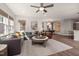 Sun-filled living room with a cozy seating area, a large rug, and stylish decor at 752 Ben Ledi Ct, Raleigh, NC 27603