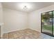 Combined view of dining area, staircase, kitchen and living room offering an airy and connected atmosphere at 7820 Falcon Rest Cir, Raleigh, NC 27615