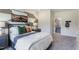 Unique bedroom with modern decor, plush bed, and a bathroom just through the doorway at 800 Emerald Bay Cir, Raleigh, NC 27610