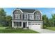 Charming two-story home with a gray exterior, manicured lawn, and an attached two-car garage at 800 Emerald Bay Cir, Raleigh, NC 27610